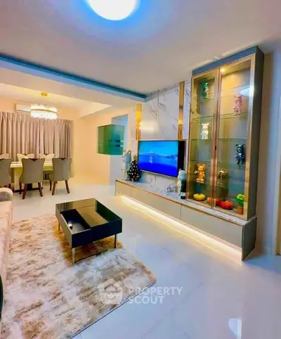 Luxurious living room with modern decor and elegant dining area