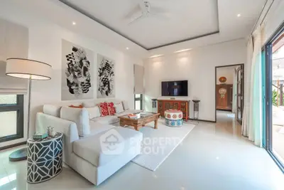 Spacious modern living room with elegant decor and natural light
