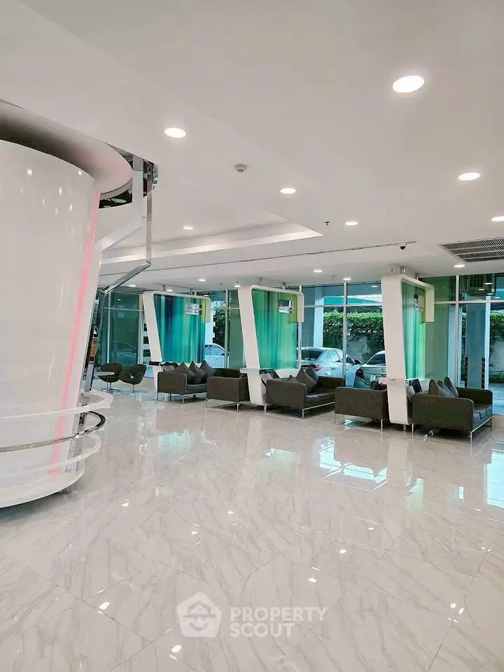 Modern building lobby with sleek design and stylish seating area