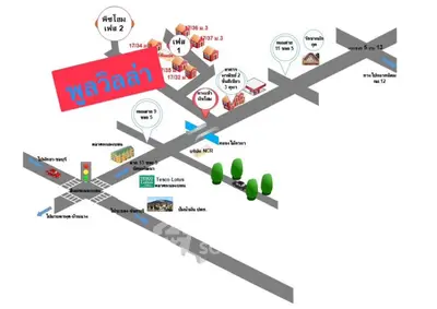 Detailed schematic map of real estate development with nearby amenities and road access.