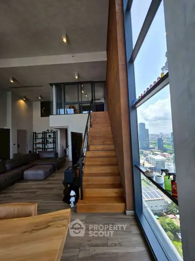 Luxurious modern living room with high ceilings and stunning city view