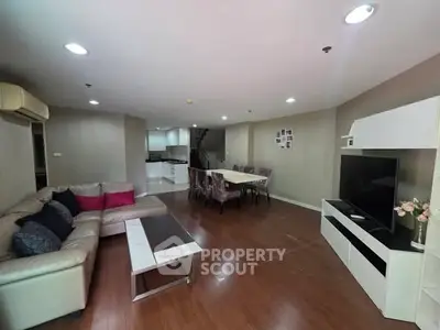 Spacious living room with modern furniture and open layout