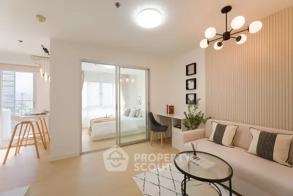 Modern open-plan living room with stylish decor and natural light