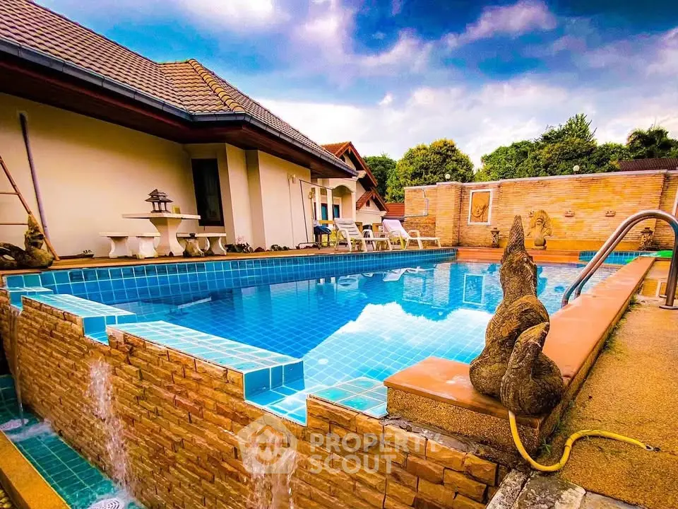Luxurious private pool with serene garden view in modern villa
