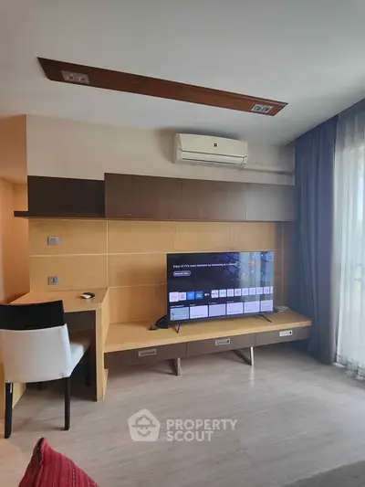 Modern living room with sleek TV setup and stylish decor