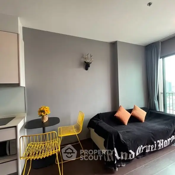 Modern living room with stylish decor and city view