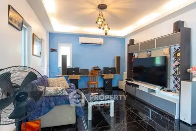 Modern living room with stylish decor and entertainment setup