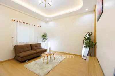 Modern living room with cozy sofa and elegant decor