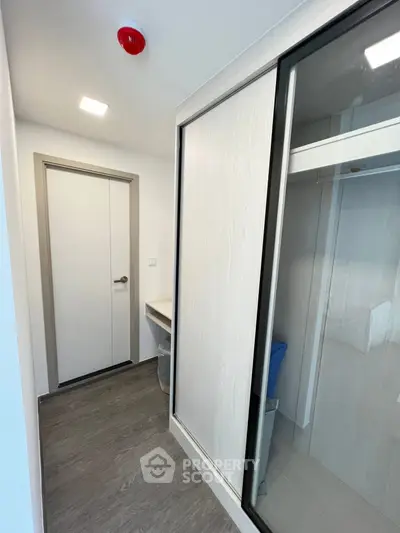 Modern storage space with sliding doors and sleek design