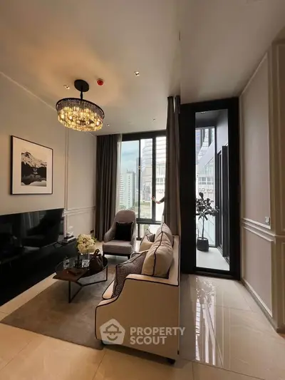 Luxurious living room with elegant chandelier and city view, featuring modern decor and floor-to-ceiling windows.