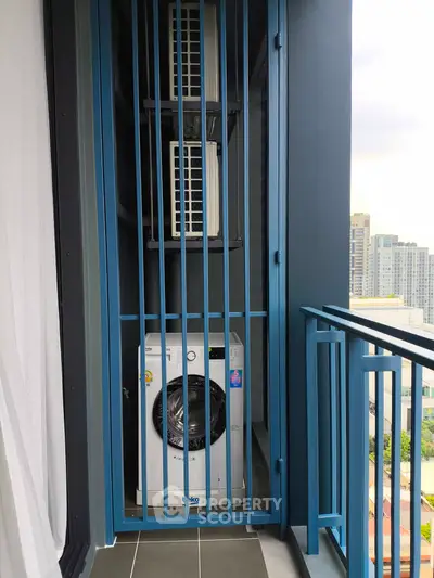Modern apartment balcony with washing machine and city view