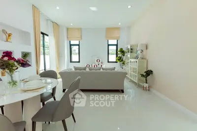 Elegant living room with modern decor and natural light