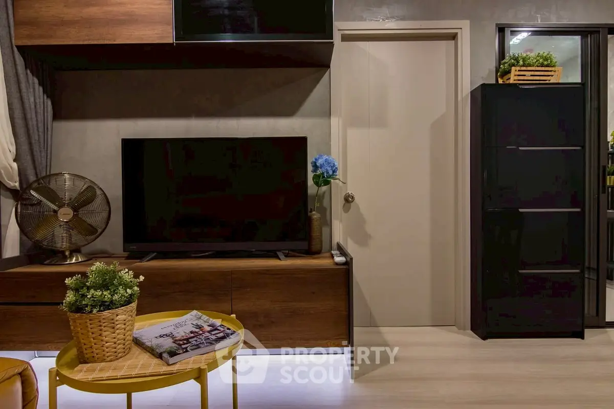 Modern living room with stylish decor and entertainment center