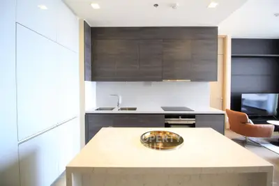 Modern kitchen with sleek cabinetry and marble island