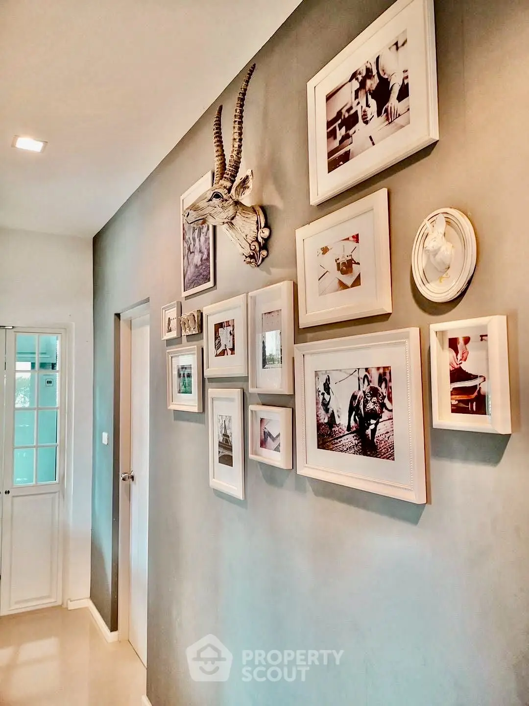 Stylish hallway with framed art and unique decor accents