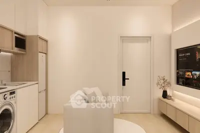 Modern minimalist living room with integrated kitchen and sleek appliances