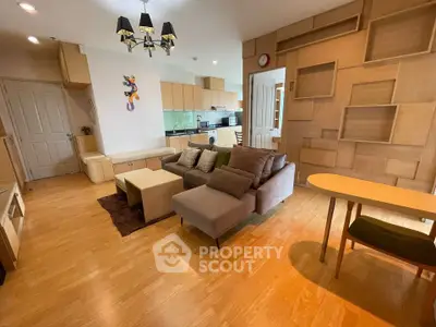 Modern living room with stylish decor and open kitchen layout