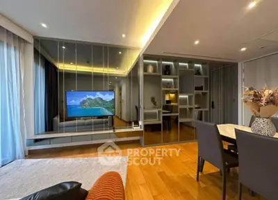 Luxurious modern living room with mirrored wall and elegant dining area