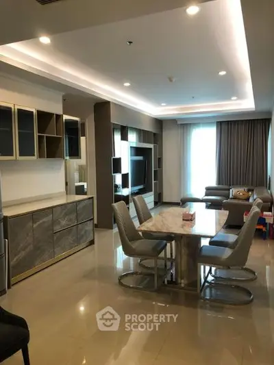 Modern living room with elegant dining area and stylish furniture