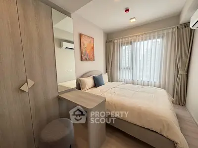 Cozy modern bedroom with stylish decor and natural light