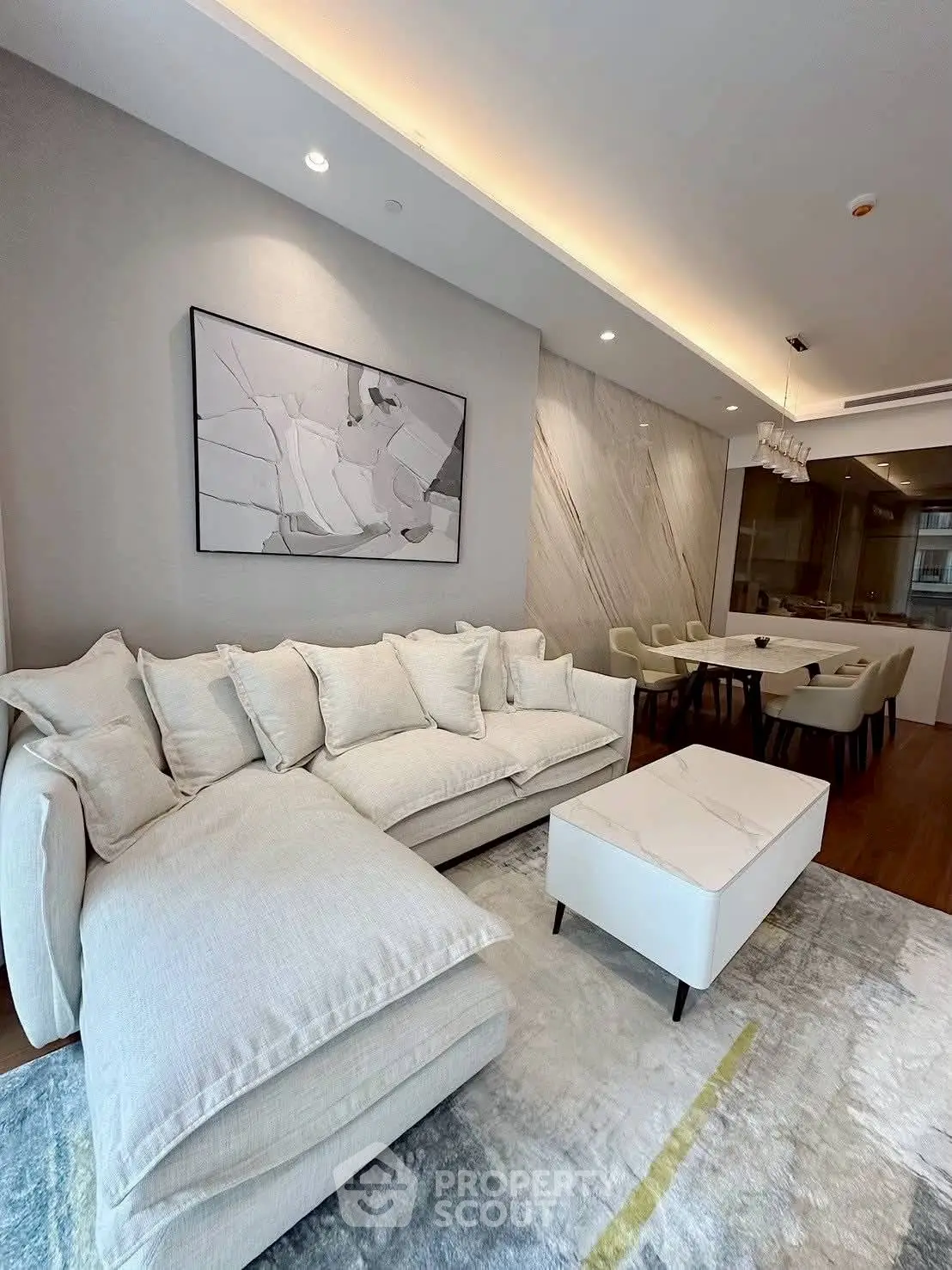 Luxurious modern living room with elegant decor and open kitchen layout