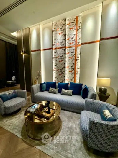 Luxurious living room with elegant decor and plush seating in a modern apartment.