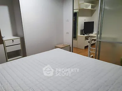 Modern bedroom with minimalist design and sliding glass doors