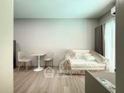 Modern living room with minimalist furniture and natural light