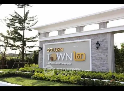 Golden Town Ladprao-Kaset Nawamin entrance sign with lush landscaping