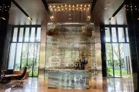 Luxurious building entrance with elegant decor and natural light