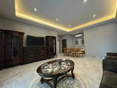 Spacious living room with elegant furniture and ambient lighting