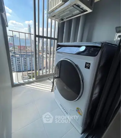 Modern balcony with washing machine and city view, perfect for urban living.