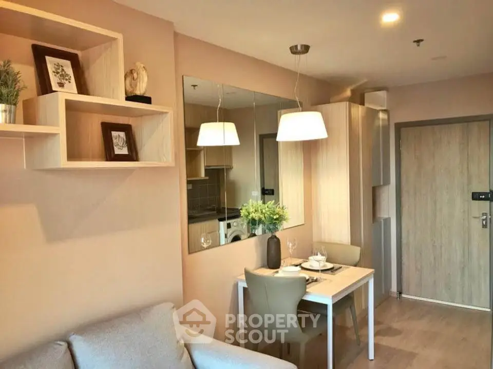 Modern living room with dining area and stylish decor in cozy apartment