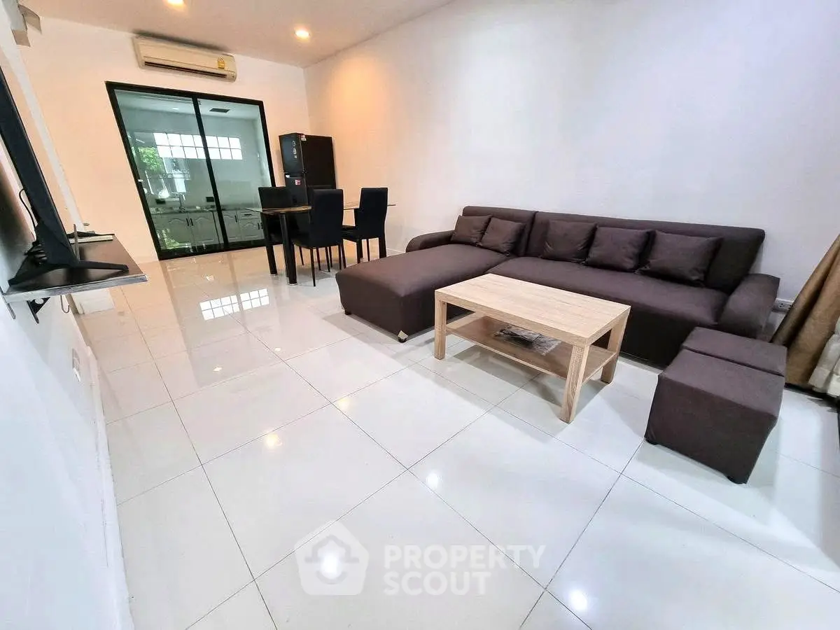 Spacious modern living room with sleek furniture and open layout
