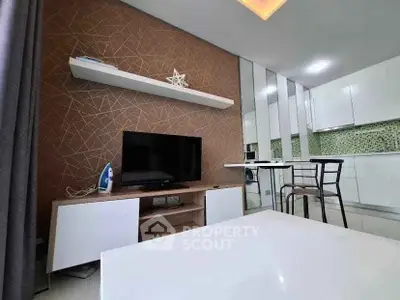 Modern living room with stylish decor and open kitchen layout