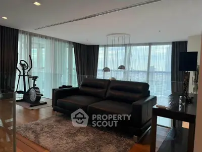 Luxurious living room with modern decor and city view