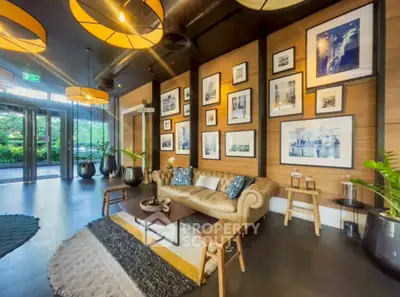 Stylish modern living room with chic decor and large windows for natural light.