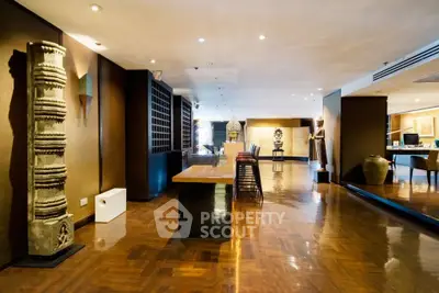 Luxurious living room with elegant wooden flooring and artistic decor