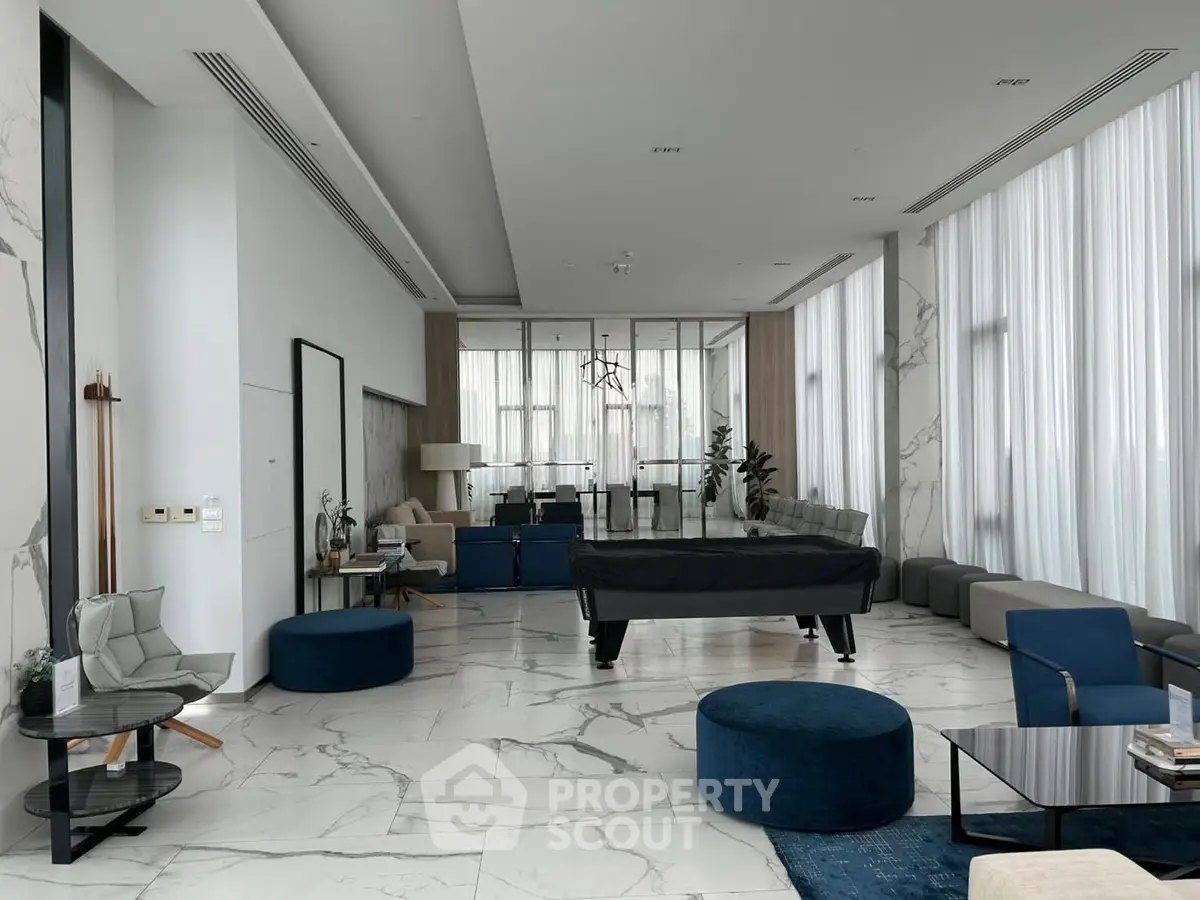 Luxurious modern living room with marble flooring and stylish furniture