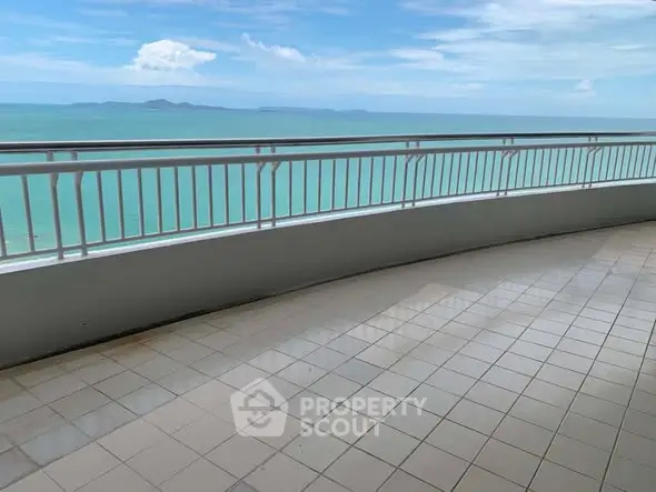 Spacious balcony with stunning ocean view, perfect for relaxation and enjoying the sea breeze.