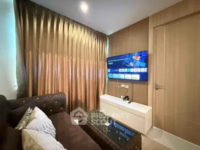 Cozy living room with modern decor and wall-mounted TV