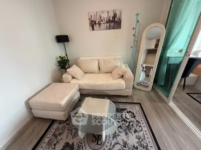 Cozy living room with modern decor and glass coffee table