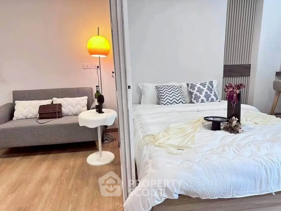 Modern studio apartment with cozy bedroom and stylish living area