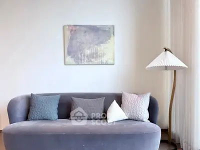 Stylish living room with modern sofa and elegant floor lamp