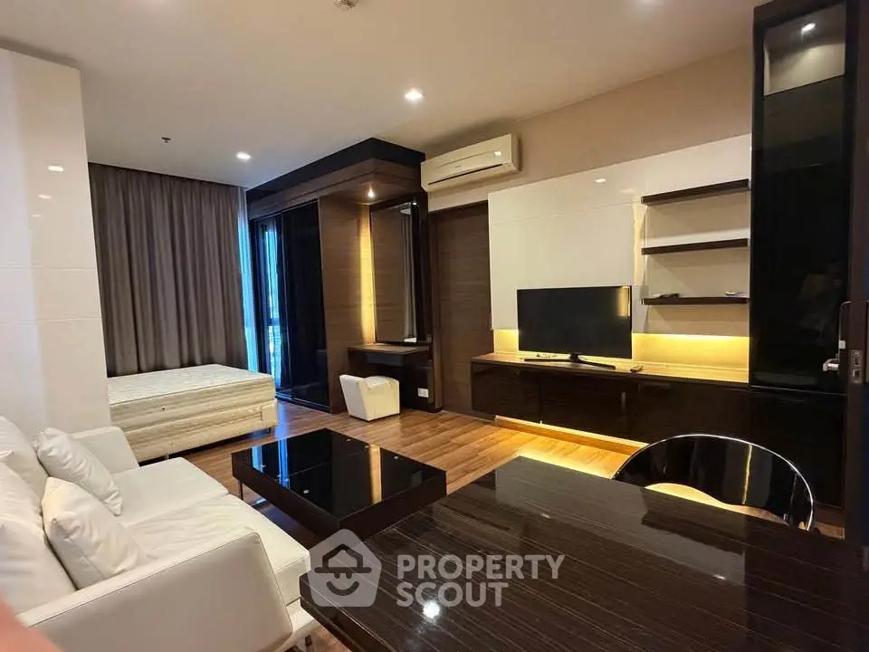 Modern living room with sleek furniture and integrated TV unit