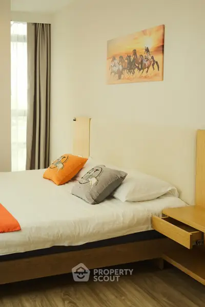 Cozy bedroom with modern decor and natural light