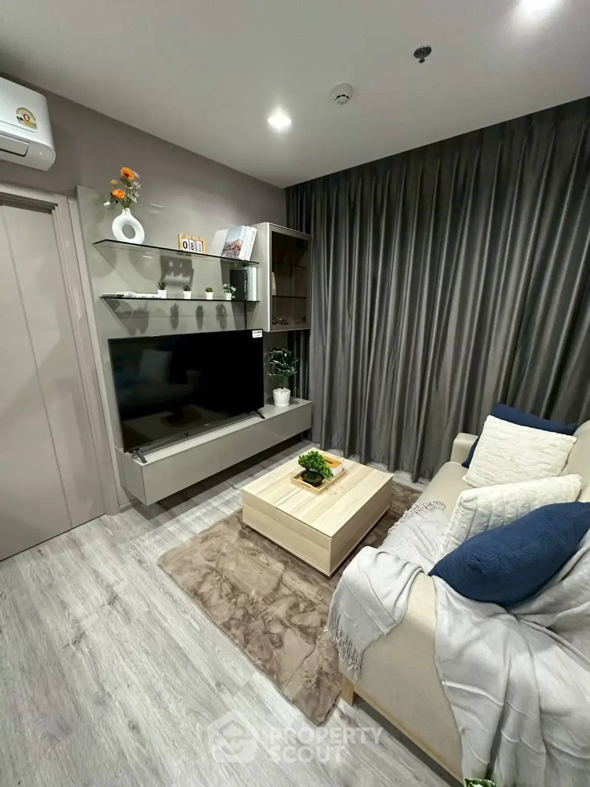 Modern living room with sleek decor and cozy seating area