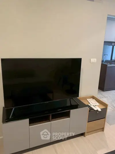 Modern living room with sleek TV stand and contemporary decor