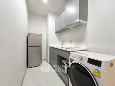 Modern kitchen with sleek appliances and minimalist design