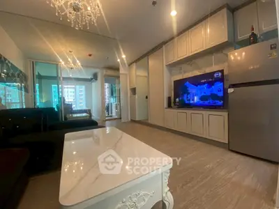 Luxurious living room with elegant decor and modern amenities in a high-rise apartment.